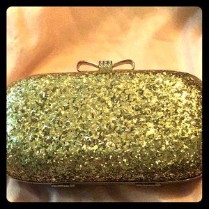 Gold clutch purse.